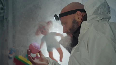 Scientist examines ice. Researcher studies frozen artifact carefully Video stock 342741076