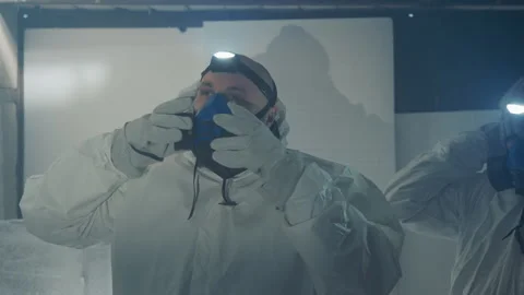 Scientist examines sample. Expert inspects chilled vial with determination Video stock 342743536