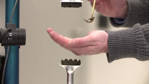 Scientist experiment on acoustic levitation in lab Stock Footage 93517667