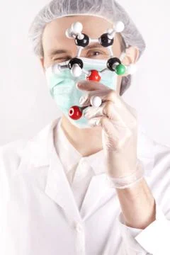 Scientist experimenting with colorfull fluids Stock Photos