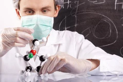 Scientist experimenting with colorfull fluids Stock Photos