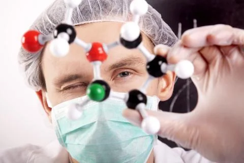 Scientist experimenting with colorfull fluids Stock Photos