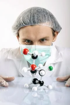 Scientist experimenting with colorfull fluids Stock Photos