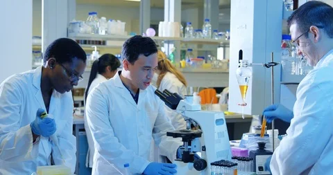 Scientist experimenting in laboratory 4k Stock Footage 95978045