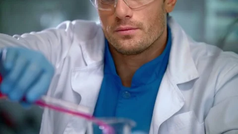 Scientist face. Portrait of researcher working in safety glasses Stock Footage 72134582