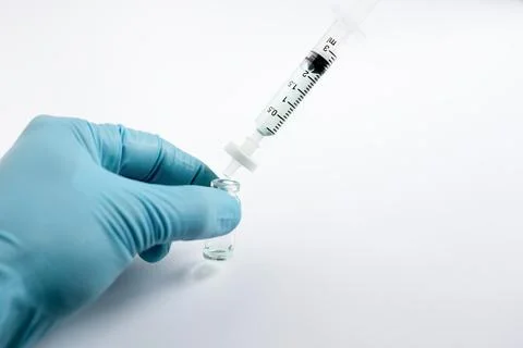 Scientist Filtering Liquid Sample into Glass Vial for HPLC Preparation Stock Photos