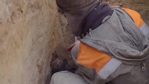 Scientist getting samples of soil Stock-Footage 105932710