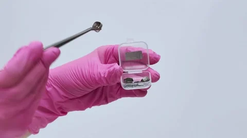 Scientist Hands in Pink Gloves Handling Material Samples with Tweezers Stock Footage 333550272