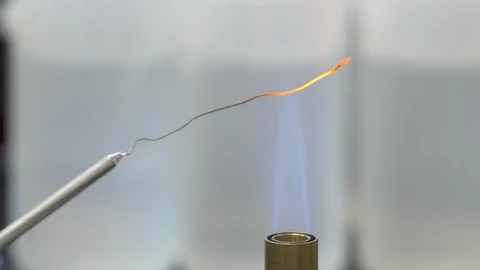 Scientist heating metal in lab Stock Footage 93524334