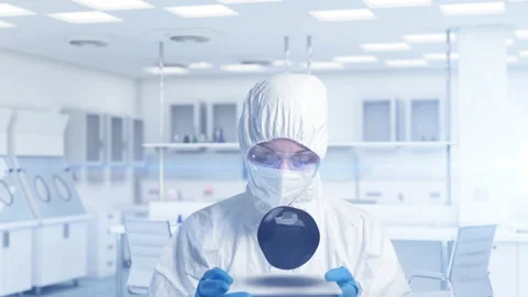 The scientist is holding some black levitating substance. the concept of new  Stock-Footage 161636632