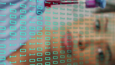 Scientist holding test tube with binary coding over laboratory animation Stock Footage 312899788