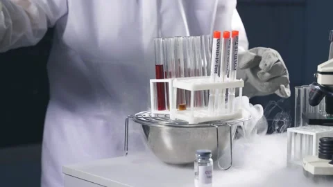 Scientist holding Test tube with sample for COVID-19 test. Stock Footage 145221320