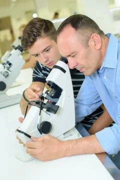 A scientist inspecting a material Stock Photos
