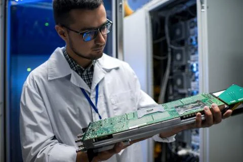 Scientist Inspecting Supercomputer 写真素材