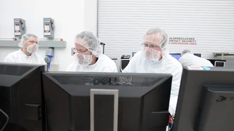 Scientist interact with each other at Orbital Sciences Corp - 2013 Stock Footage 112273360