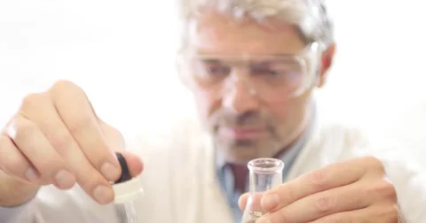 A scientist in a lab examining the water hardness Stock Footage 48985276