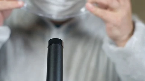 Scientist in laboratory  looking in microscope.  Laboratory tools: microscope Stock Footage 120344541