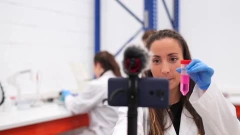 Scientist live streaming on phone Stock Footage 255196442