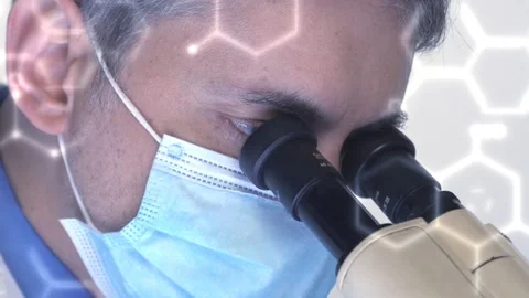 Scientist Looking In Microscope Close Up Stockbeeldmateriaal 200741203