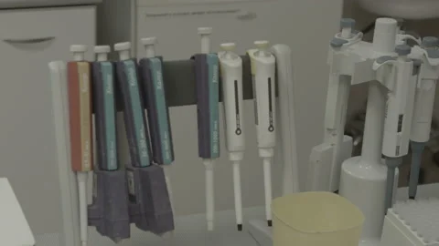 Scientist makes tests in the laboratory Video stock 143159755