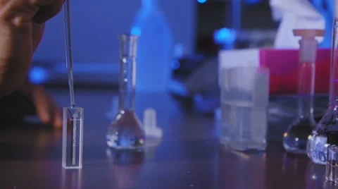 Scientist making an experiment Stock Footage 57768559