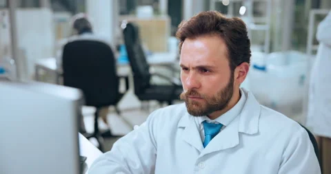 Scientist, man and computer with thinking in laboratory for medical study, test Stock Footage 319042465
