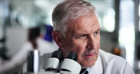 Scientist, man and microscope at laboratory in study, test or review for sample Stock Footage 305925945