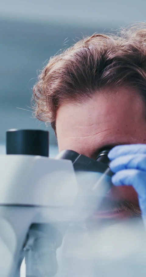 Scientist, man and project in lab with microscope, experiment and test sample Stock Footage 331506461