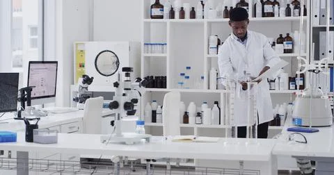 Scientist, man or reading folder in lab for clinical trial results, vaccine.. Stockfoto's