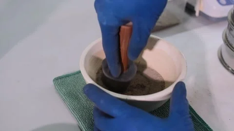 Scientist Manually By Hands Mills A Soil Sample For Experiments Stock Footage 231739395