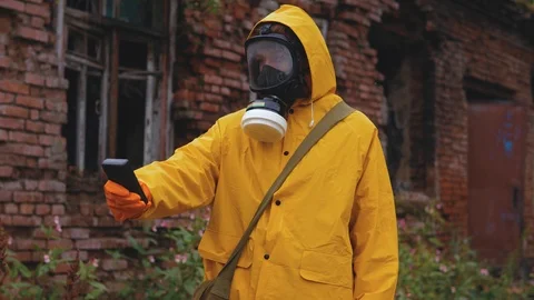 The scientist measures the level of radiation. Stock Footage 94910360