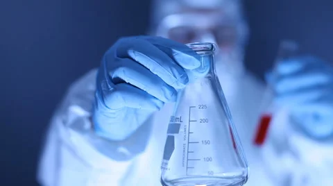 Scientist measuring liquid Stock-Footage 61665379
