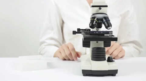 Scientist with microscope Stock Footage 54827664