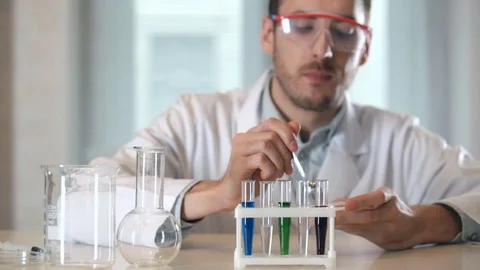 Scientist mixes the white powder Stock-Footage 73111166