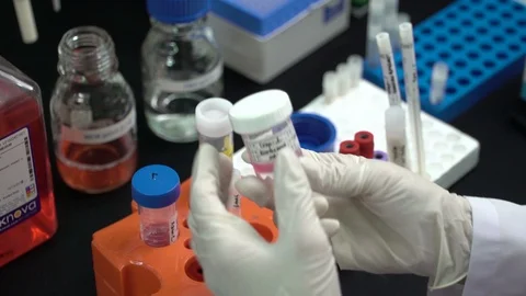 Scientist Mixing Liquid at Laboratory Stock Footage 127086341