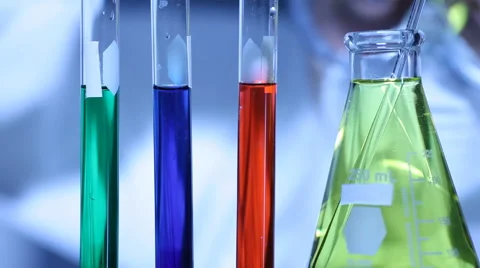 Scientist mixing liquids Stock Footage 61665412