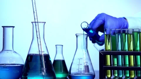 Scientist Mixing Liquids Stock Footage 202147784
