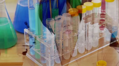 Scientist multiple exposure with test tubes and sample tubes Stock Footage 105855487