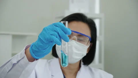 Scientist or doctor Put medical mask. Concept Coronavirus Stock Footage 141328853