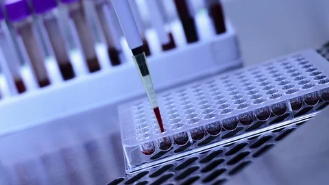 Scientist or doctor testing in laboratory for analysis or researching Stock Footage 90611343