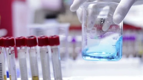 Scientist or doctor testing in laboratory for analysis or researching Stock Footage 90630618