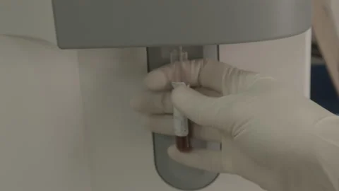 Scientist performs a blood test for covid Video stock 143161214