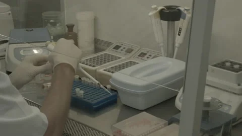Scientist performs a blood test for covid Video stock 143161494