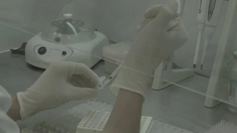 Scientist performs a blood test for covid Video stock 143161521