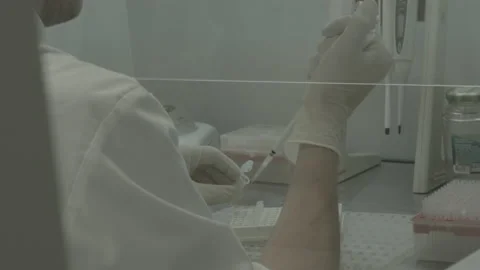 Scientist performs a blood test for covid Video stock 143161549
