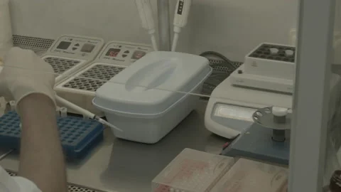 Scientist performs a blood test for covid Video stock 143161571