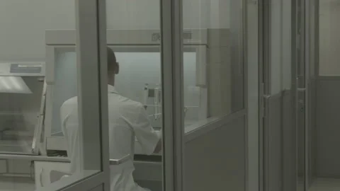 Scientist performs a blood test for covid Video stock 143161593