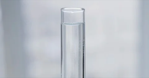 Scientist with pipette analyzes red colored liquid to extract the DNA 스톡 동영상 126163971
