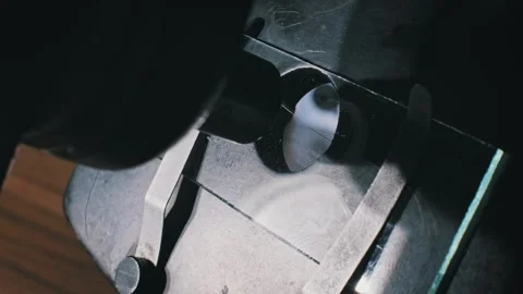 Scientist Placing Hair Sample on Microscope Stage Stock Footage 319664785