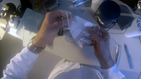 Scientist POV shot conducting experiments in the lab v2 Stock Footage 117863300